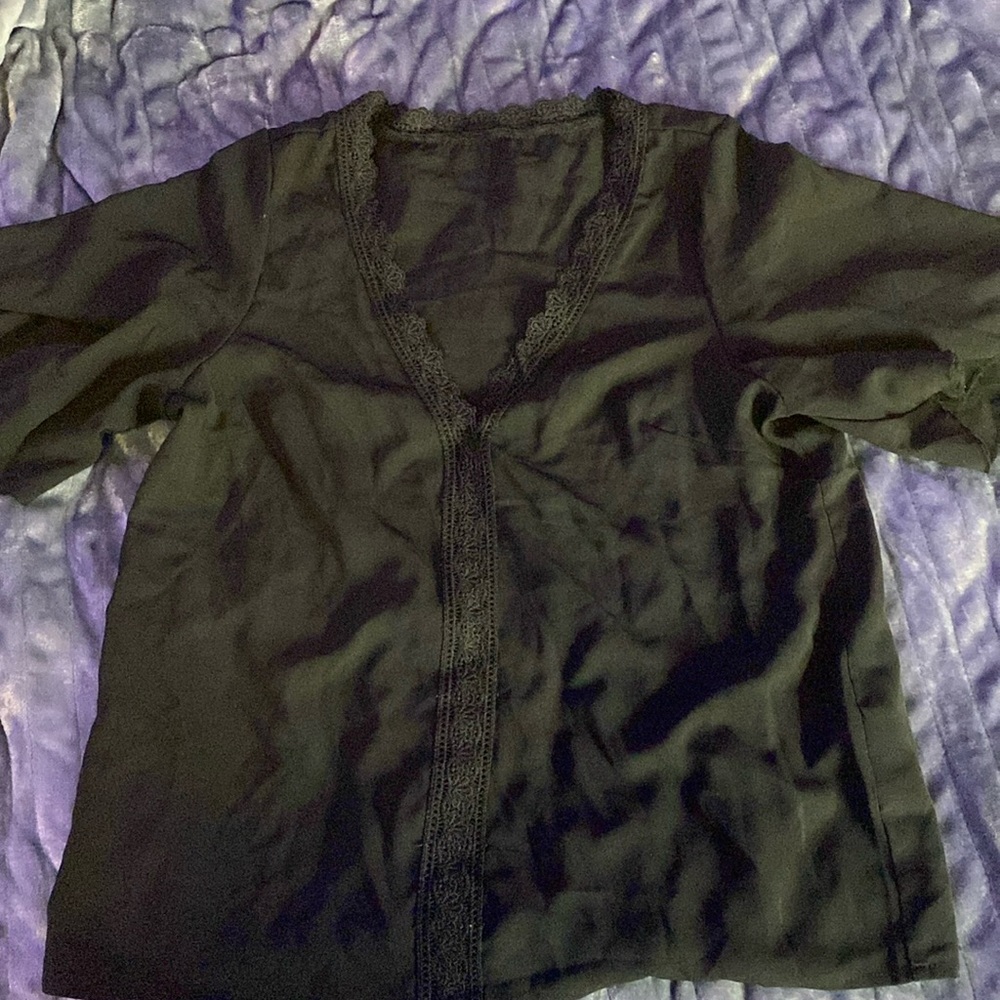 Medium. 97% polyester 3% spandex